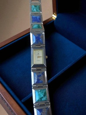 Montre femme vintage HC bracelet quartz pierres bleues vertes rétro