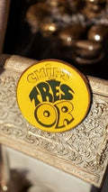 Pin's publicitaire vintage CHIPS TRESOR jaune rond - badge rare années 80