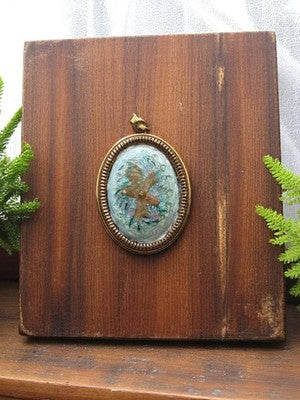 Pendentif vintage ovale créateur années 60 motif floral doré rétro