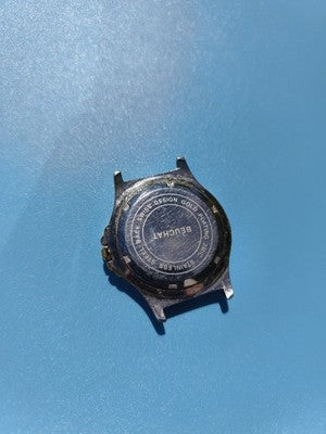 Montre homme vintage Beuchat Elf collector non testée, cadran blanc noir doré