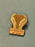 Vintage pin's La Mutuelle du Midi mains dorées logo rétro collection (Ref 8)