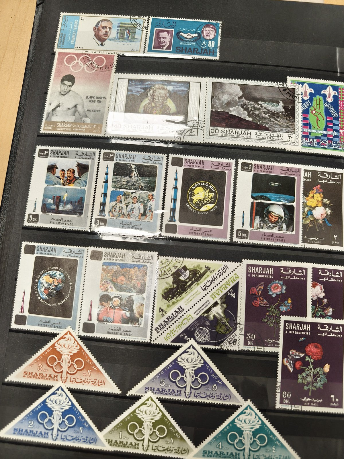 Lot de timbres Sharjah thème espace, sport et fleurs, formes variées, d?occasion