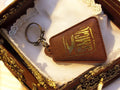 Porte-clés vintage SINDIA marron aspect cuir publicitaire rétro