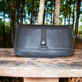 Trousse de toilette femme cuir marron, aspect grainé, occasion élégante