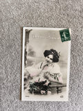 Carte postale Bonne Année femme fleurie CPA timbre 5c JAK Paris