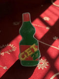 Pin's ancien bouteille GET 27 vert rouge, publicité apéritif vintage rétro