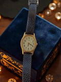 Montre femme Alba vintage cadran doré, ancien modèle à pile, bracelet texturé