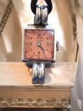 Montre femme vintage Ancre 15 rubis mécanique cadran rose carré années 50