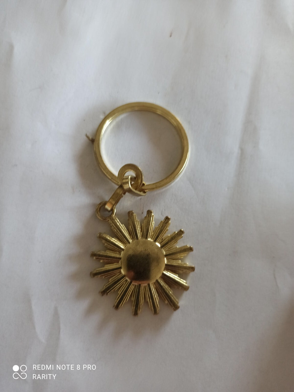Porte-clés soleil doré Éditions Atlas vintage rétro élégant
