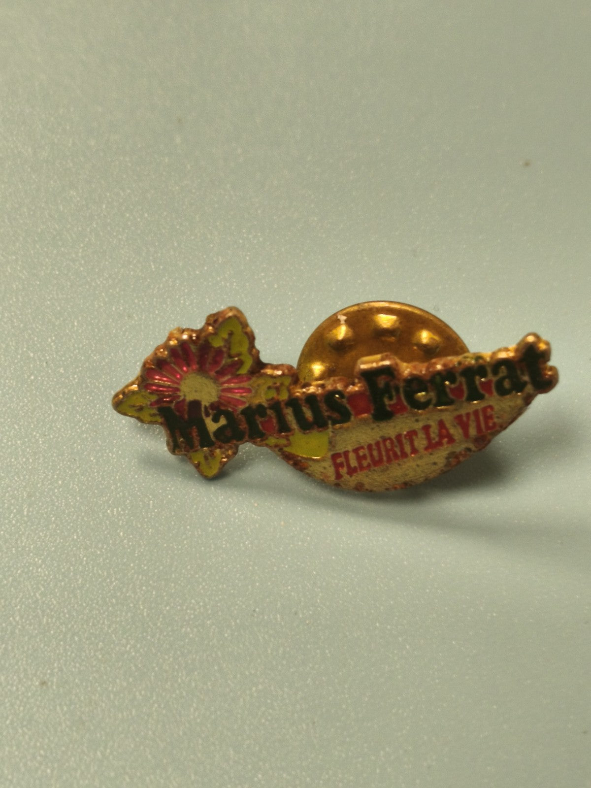 Vintage pin's Marius Ferrat fleur émaillée publicitaire rare collection