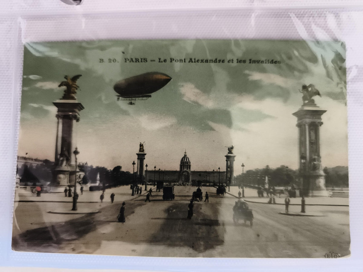 Carte postale CPA Paris Pont Alexandre III dirigeable colorisée