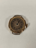 Montre ancienne à restaurer cadran rond doré vintage pour collectionneur