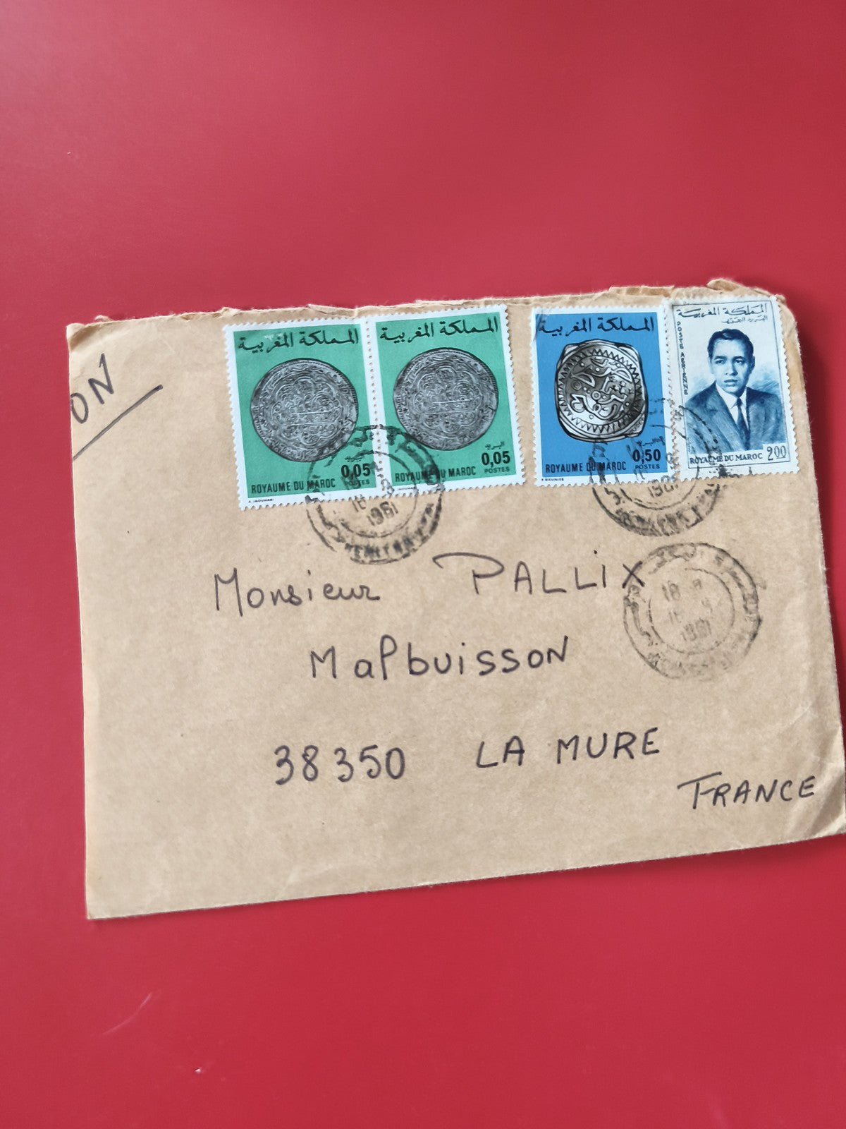 Enveloppe affranchie timbres Maroc ? cachets visibles, adressée France