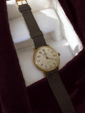 Montre homme vintage Albion quartz, cadran blanc, bracelet aspect cuir ancien