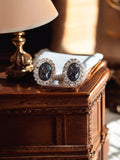 Boucles d’oreilles vintage ovales, noir et cristal, design rétro chic