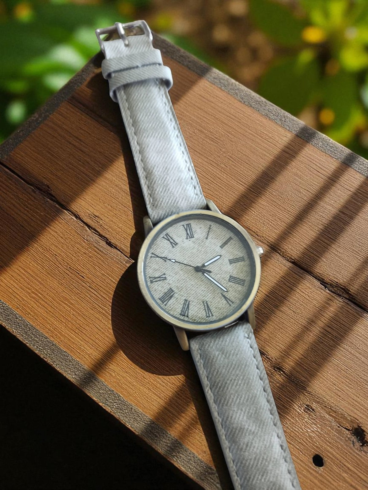 Montre homme vintage cadran chiffres romains gris rétro non testée