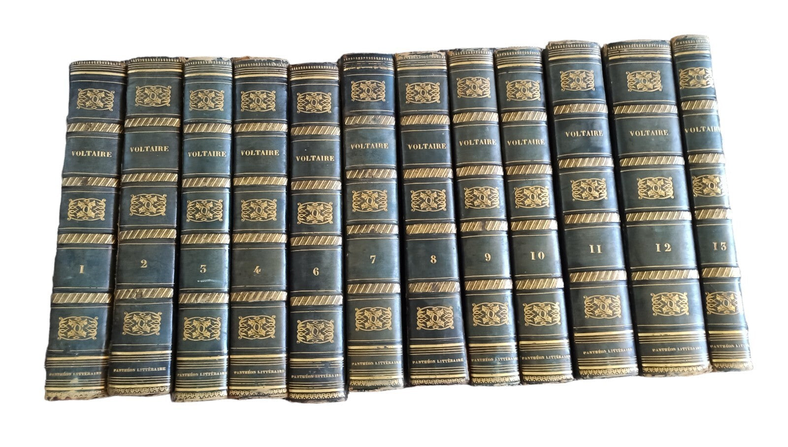 Œuvres complètes Voltaire 12 tomes cuir noir doré 1838 reliure Pantheon Littérai