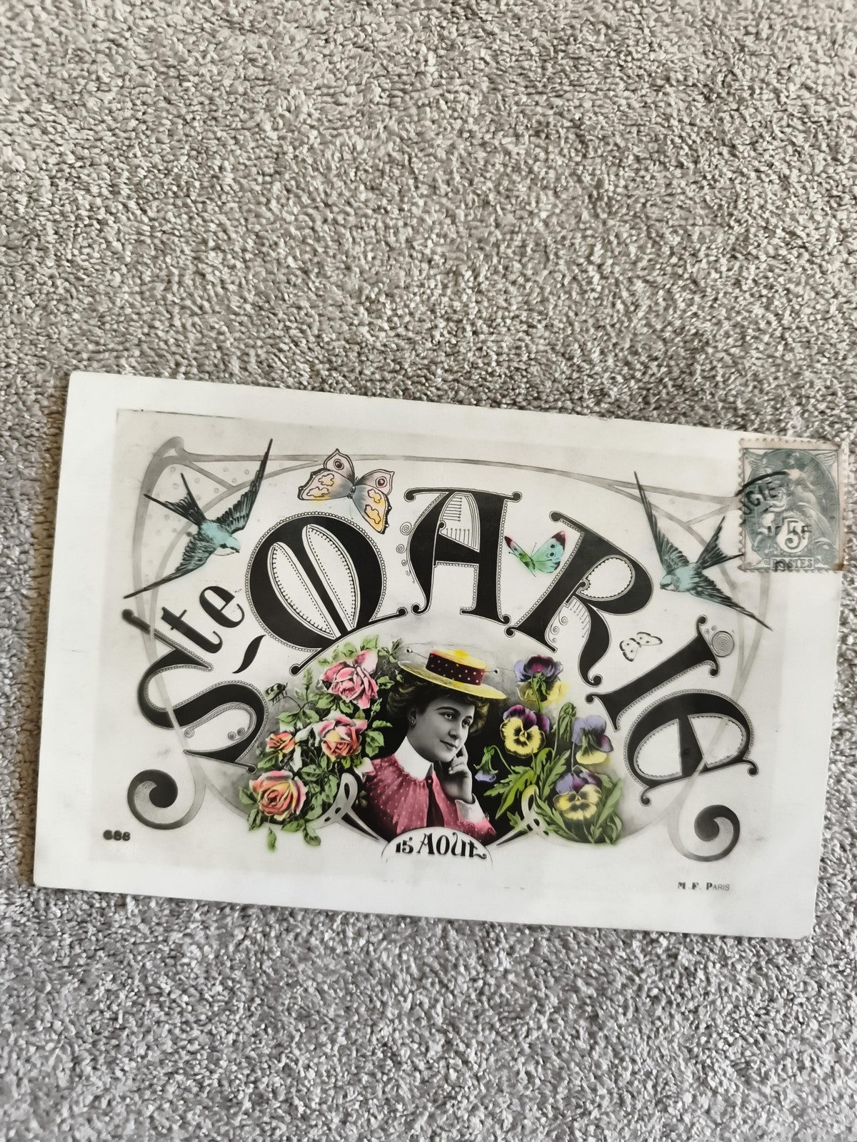 CPA Ste Marie 15 Août illustrée femme fleurs papillon timbre décor