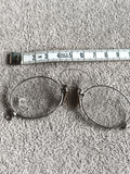 Pince-nez ancien lunettes rondes vintage monture métal aspect argenté