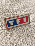 Pin's vintage TF1 logo ancien, badge émaillé rectangulaire années 80/90 (Ref 6)