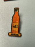 Pin's vintage Agruma bouteille soda orange, objet publicitaire rétro collection