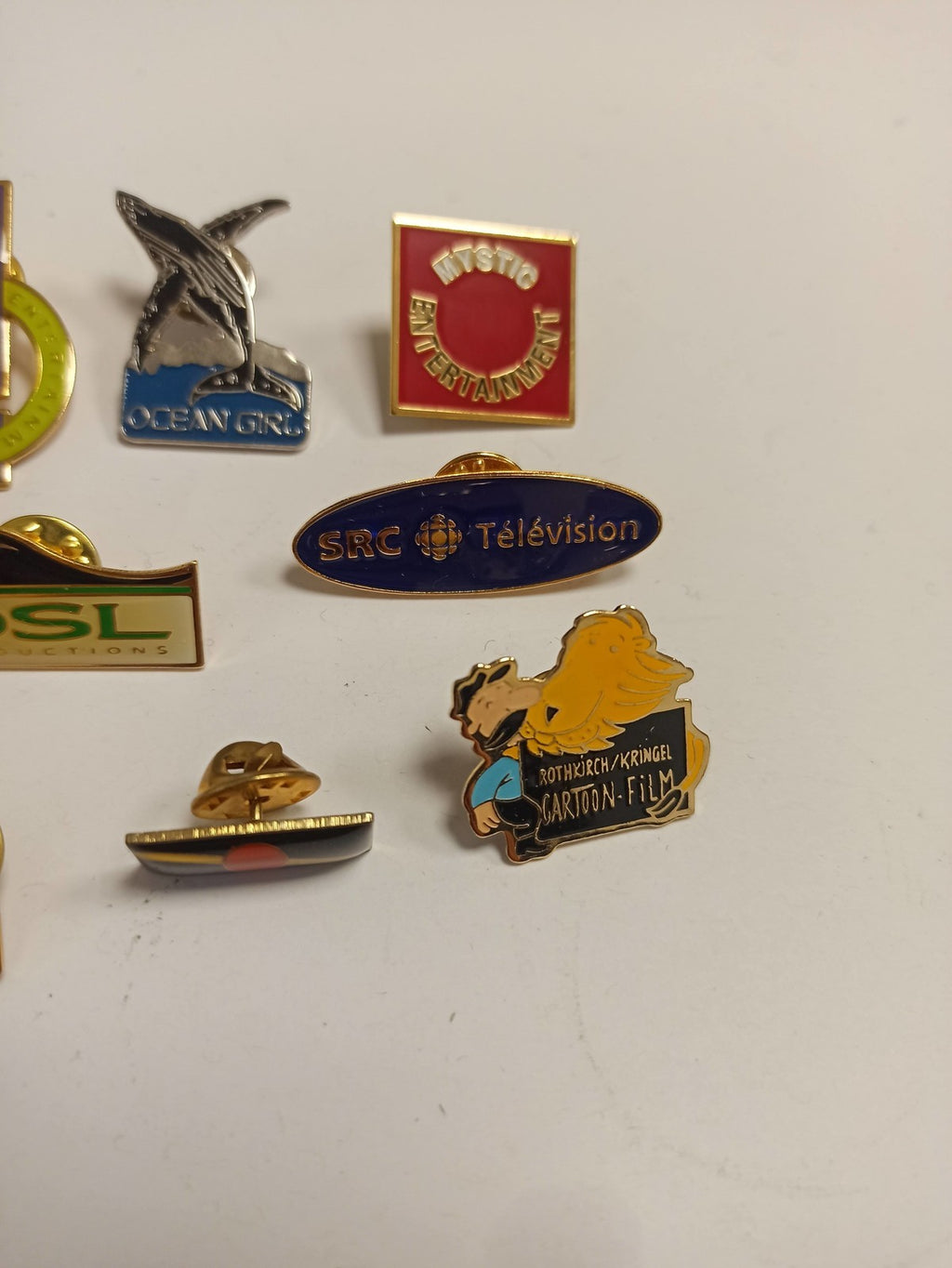 Lot 10 pin's publicitaires vintage TV médias, SRC Télévision, Ocean Girl