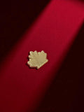 Pin's vintage feuille dorée publicitaire années 80 - badge émail rétro