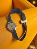 Montre femme ORIS mécanique vintage cadran beige bracelet noir années 60/70