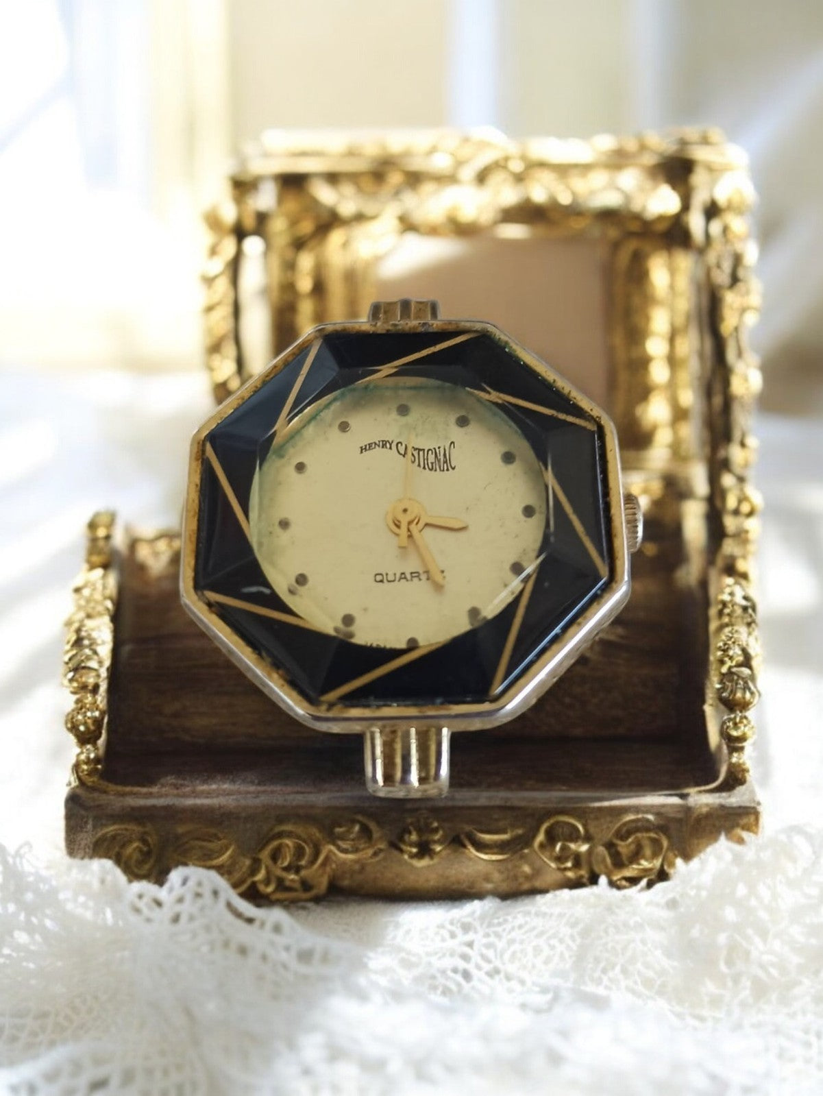 Montre vintage femme Henry Castignac cadran octogonal noir doré quartz