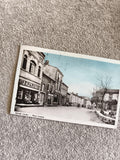 Carte postale CPA BRAM Aude Place Lannes magasin Épargne couleur