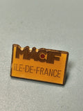 Vintage pin's MACIF Ile-de-France jaune rectangulaire collection assurance