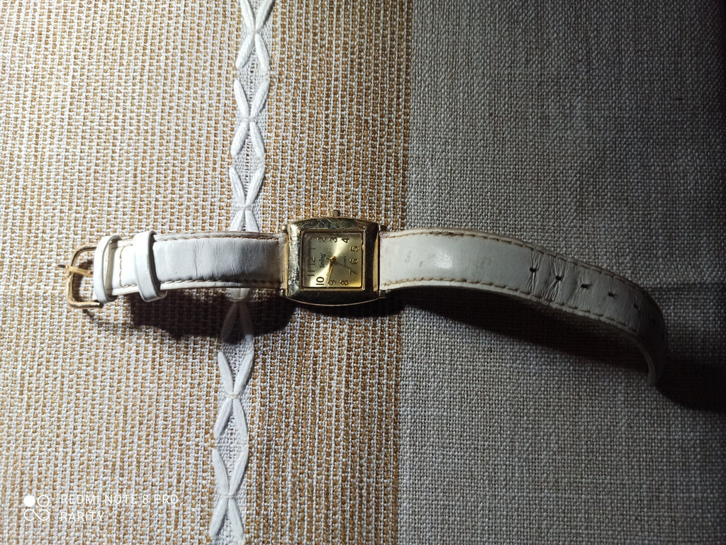 Montre femme Timing vintage, cadran doré, bracelet blanc, à réparer