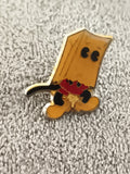 Pin's vintage personnage sac papier émaillé, style cartoon années 90 (Ref 8)