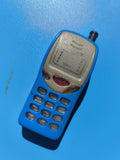 Ancien briquet publicitaire forme téléphone portable bleu vintage collection