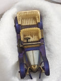 Véhicule miniature ancien voiture rétro vintage, finition violette, sièges crème