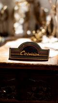 Pin's vintage Citévision logo Art déco, badge rare ancien publicitaire