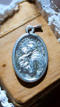 Médaille ancienne Saint Antoine ovale métal argenté protection religieuse vintag