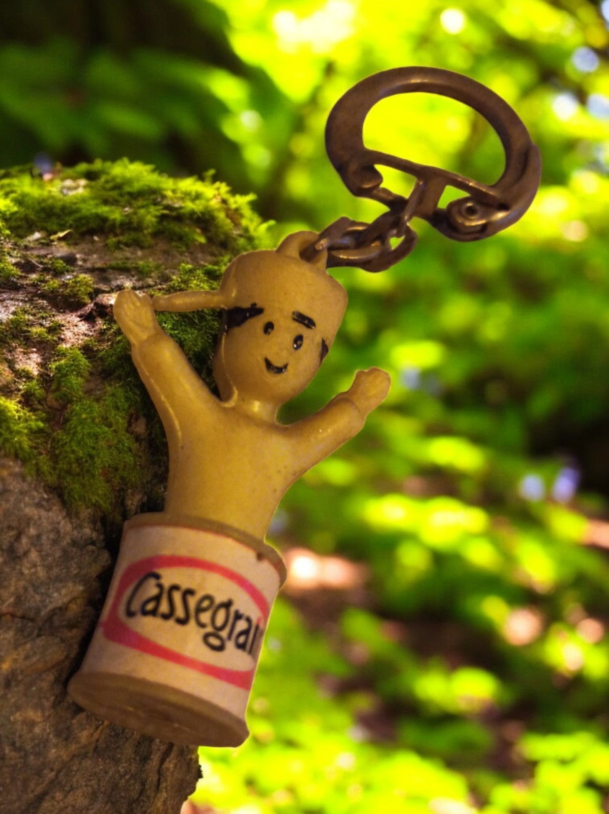 Porte-clés vintage Cassegrain figurine publicitaire métal aspect ancien