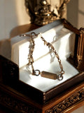 Bracelet gourmette vintage plaqué or, maillons ajourés élégant