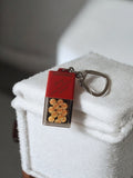 Porte-clés vintage BARTISSOL publicitaire ancien rouge transparent rétro rare