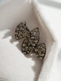 Broche vintage nœud strass métal argenté rétro bijou ancien fantaisie