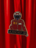 Pin's A. Prost 91 vintage pilote F1 badge rétro années 90 publicité