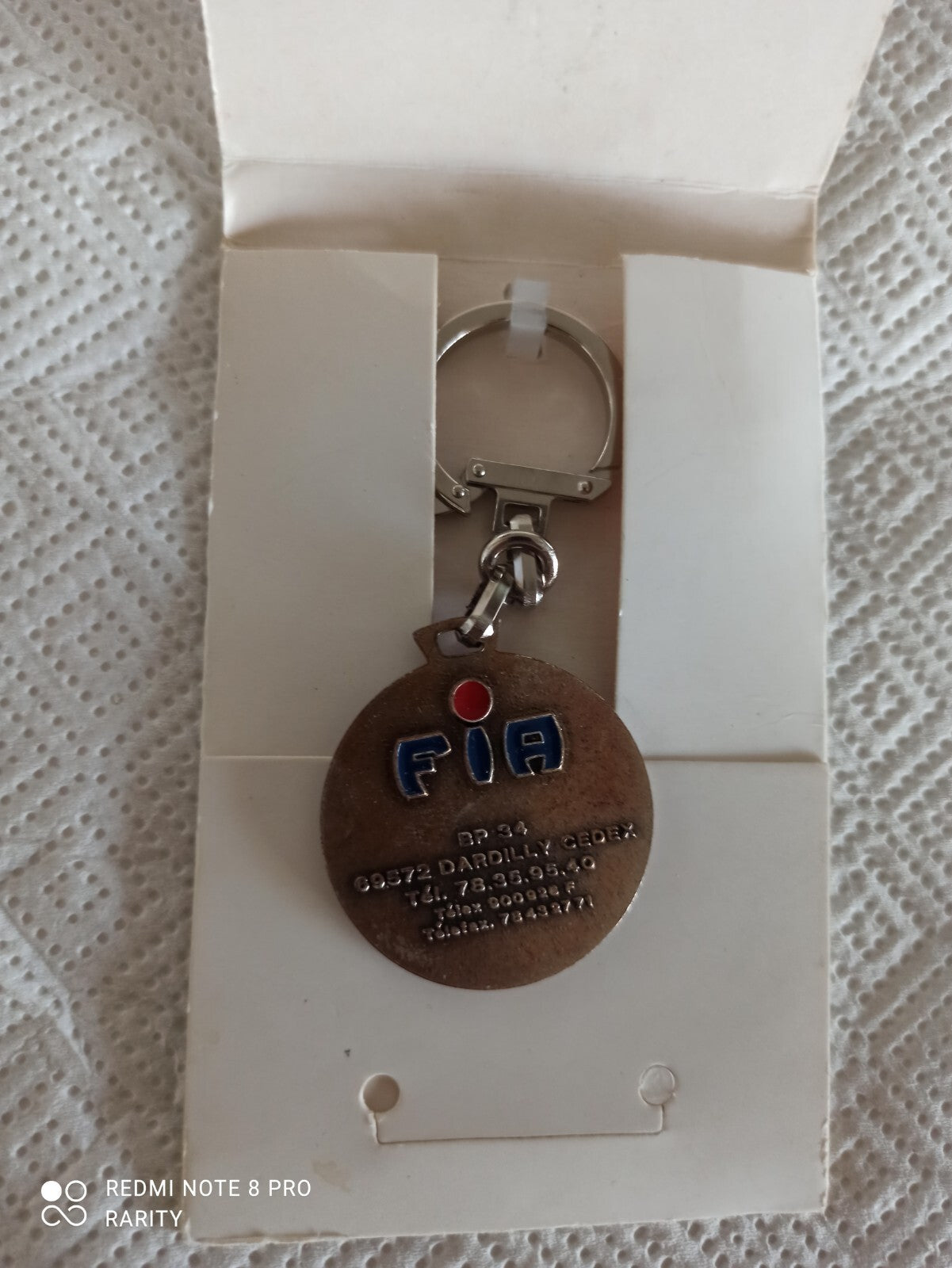 Porte-clés vintage Groupe FIA logo relief, aspect bronze, en boîte ancienne