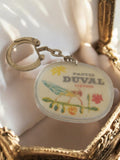 Porte-clés publicitaire vintage Pastis Duval liqueur France, ovale illustré