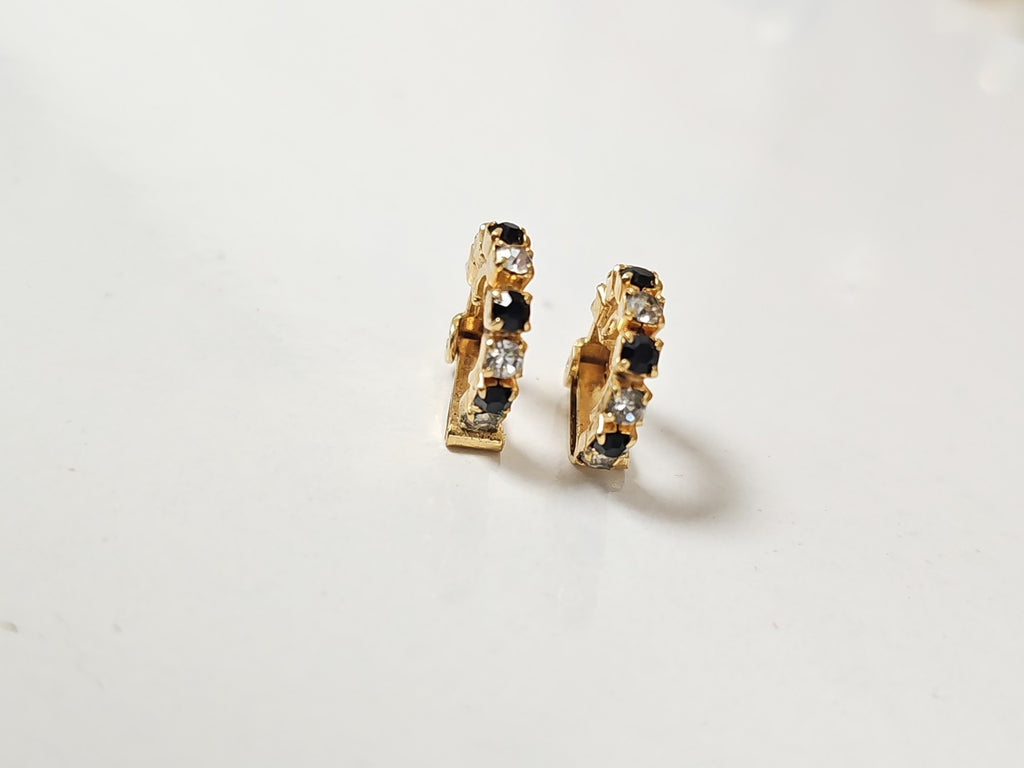 Pair of vintage earrings, old retro jewelry for collector