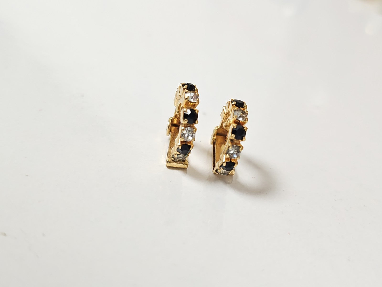 Pair of vintage earrings, old retro jewelry for collector