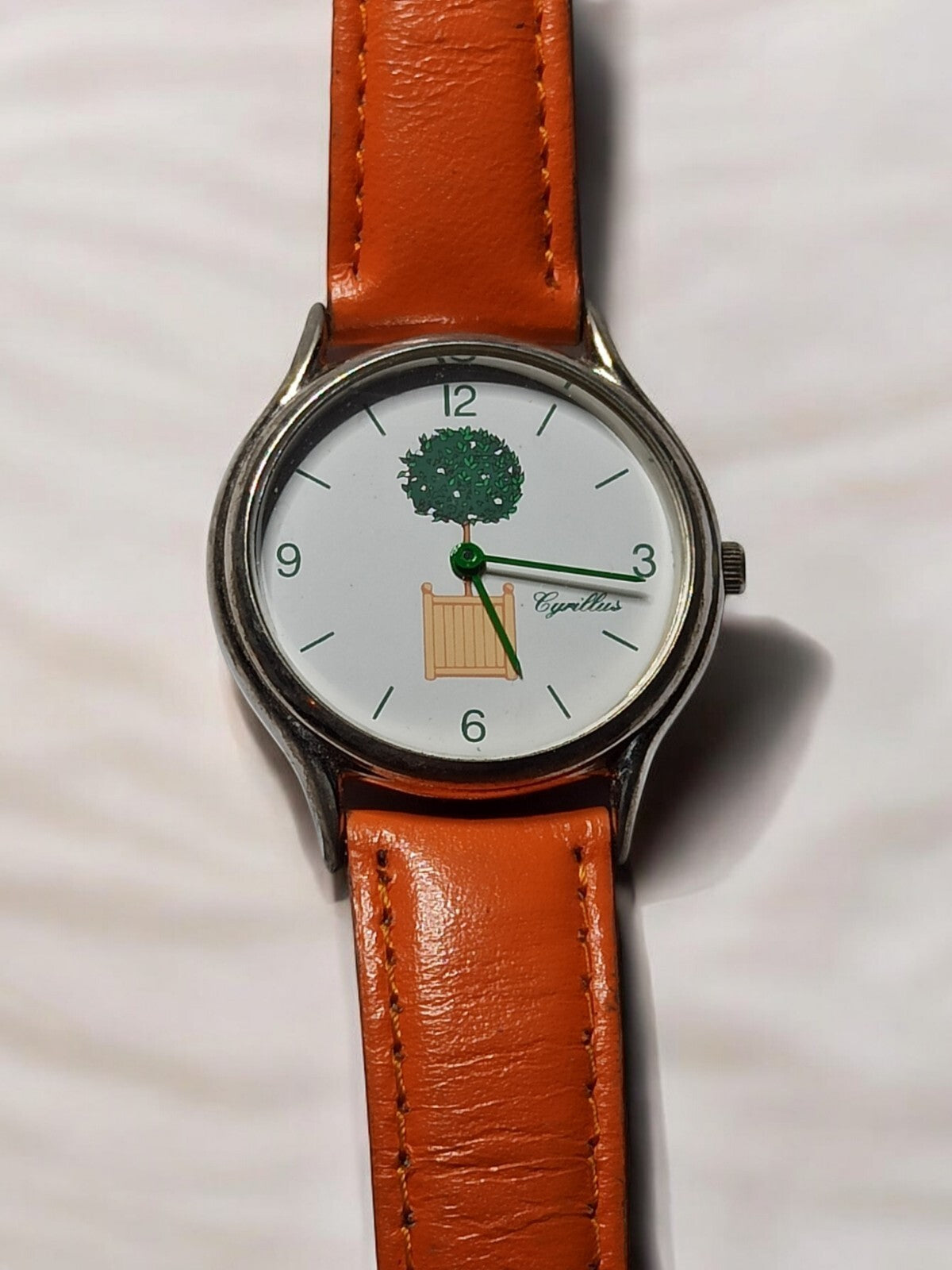 Montre femme Cyrillus vintage cadran décor arbre bracelet orange pile