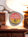 Porte-clés vintage publicitaire La crotte du diable