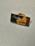 Pin's vintage Lindt émaillé, logo chocolatier, collection publicitaire