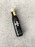 Miniature alcool ENKELT bitter 2cl bouteille partiellement remplie